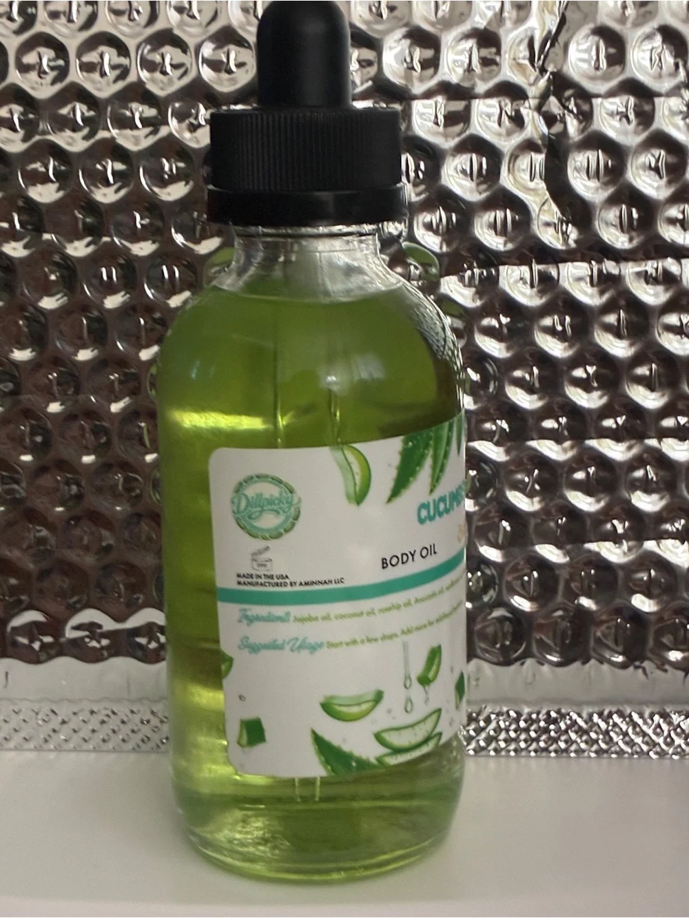 Cucumber Aloe Body Oil made by Dillpicky which is manufactured by Aminnah